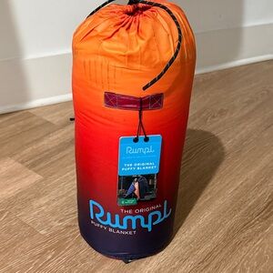 BRAND NEW Rumpl Puffy Blanket in Orange and Red